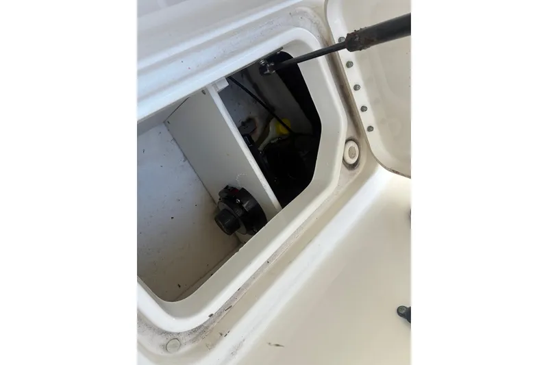 Slide: The Image of Open storage compartment in 2014 Sea Ray 240 Sundeck boat. - 49
