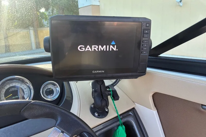 Slide: The Image of Garmin GPS system in 2014 Sea Ray 240 Sundeck boat cockpit. - 43