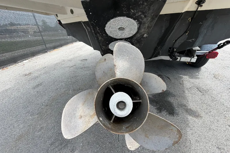 Slide: The Image of Propeller of a 2014 Sea Ray 240 Sundeck boat on a trailer. - 6