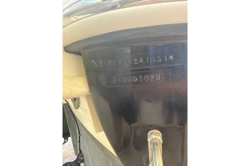 Slide: The Image of 2014 Sea Ray 240 Sundeck boat hull identification number close-up. - 59