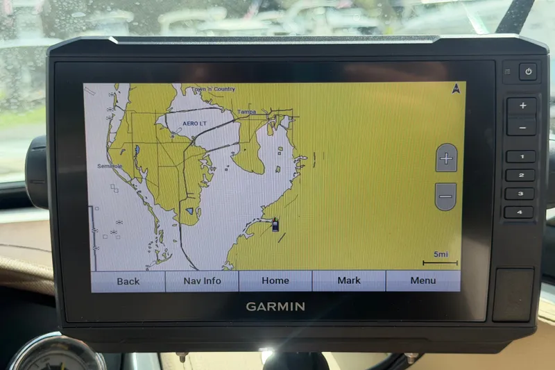 Slide: The Image of Garmin GPS displaying nautical map on 2014 Sea Ray 240 Sundeck boat. - 33