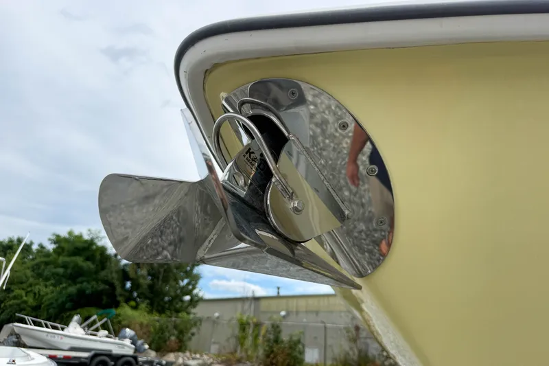 Slide: The Image of Close-up of a 2013 Boston Whaler 32 Justice boat propeller and hull detail. - 3