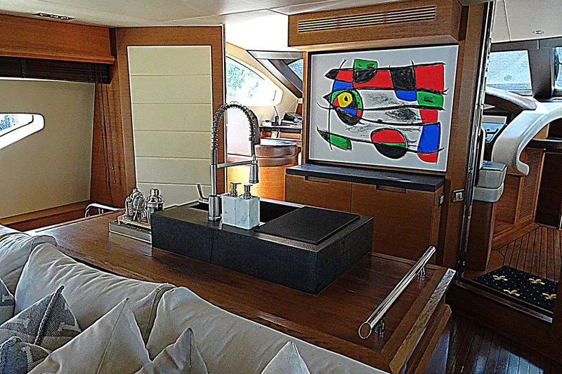 Slide: The Image of Luxurious interior of 2010 Azimut 100 Leonardo yacht with modern art and sleek design. - 14