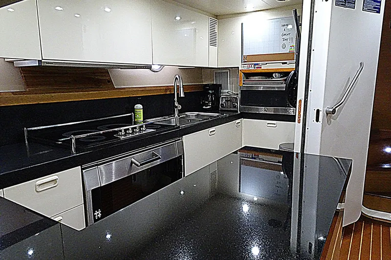 Slide: The Image of Luxurious kitchen interior of 2010 Azimut 100 Leonardo yacht with modern appliances. - 46