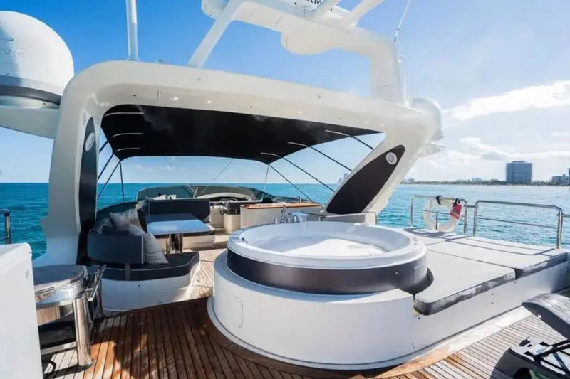 Slide: The Image of Luxurious 2010 Azimut 100 Leonardo yacht with jacuzzi and seating area on deck. - 1