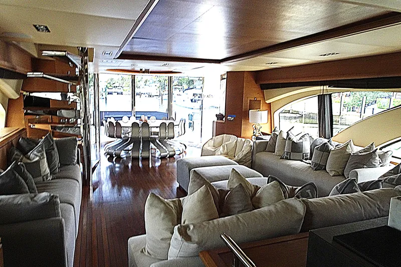 Slide: The Image of Luxurious interior of 2010 Azimut 100 Leonardo yacht with elegant seating and dining area. - 18