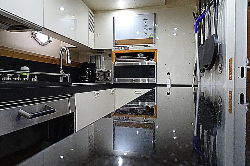 Slide: The Image of Luxurious kitchen interior of 2010 Azimut 100 Leonardo yacht with modern appliances. - 49