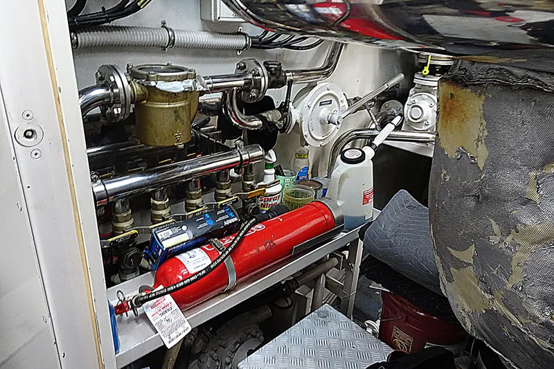 Slide: The Image of Engine room of 2010 Azimut 100 Leonardo yacht with fire extinguisher and mechanical components. - 68