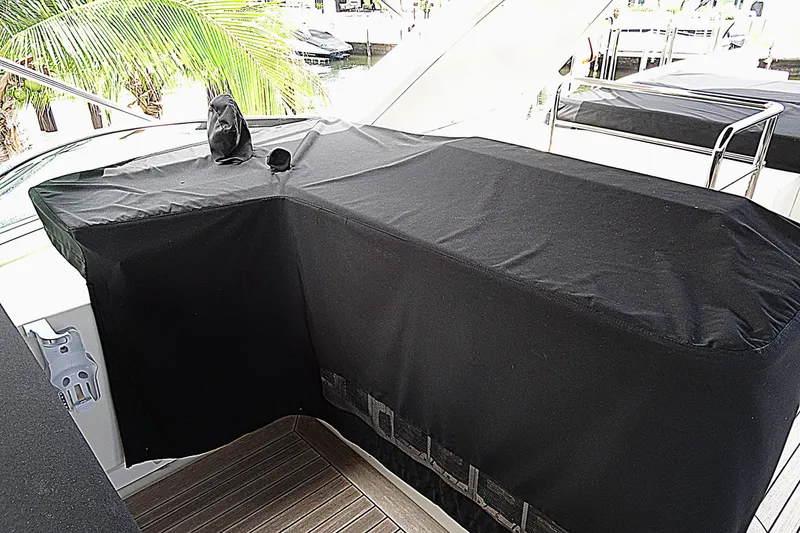 Slide: The Image of Covered deck area on a 2010 Azimut 100 Leonardo yacht, featuring sleek design elements. - 72