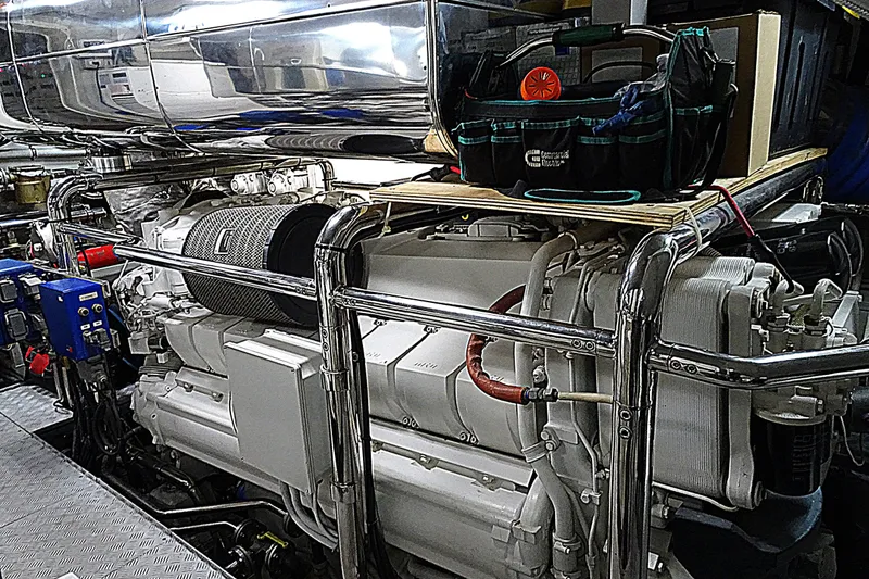 Slide: The Image of Engine room of 2010 Azimut 100 Leonardo yacht, showcasing machinery and equipment. - 65