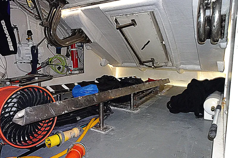Slide: The Image of Engine room of 2010 Azimut 100 Leonardo yacht with equipment and storage. - 61