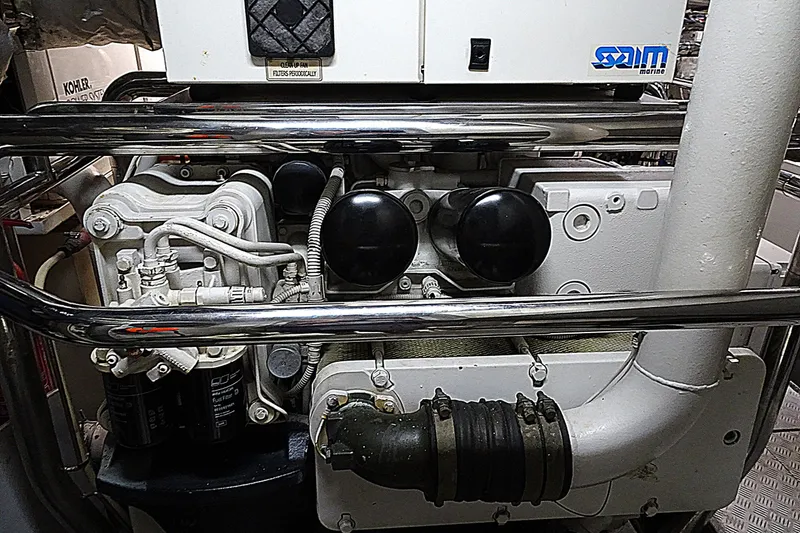 Slide: The Image of Engine room of 2010 Azimut 100 Leonardo yacht, featuring mechanical components and piping. - 62