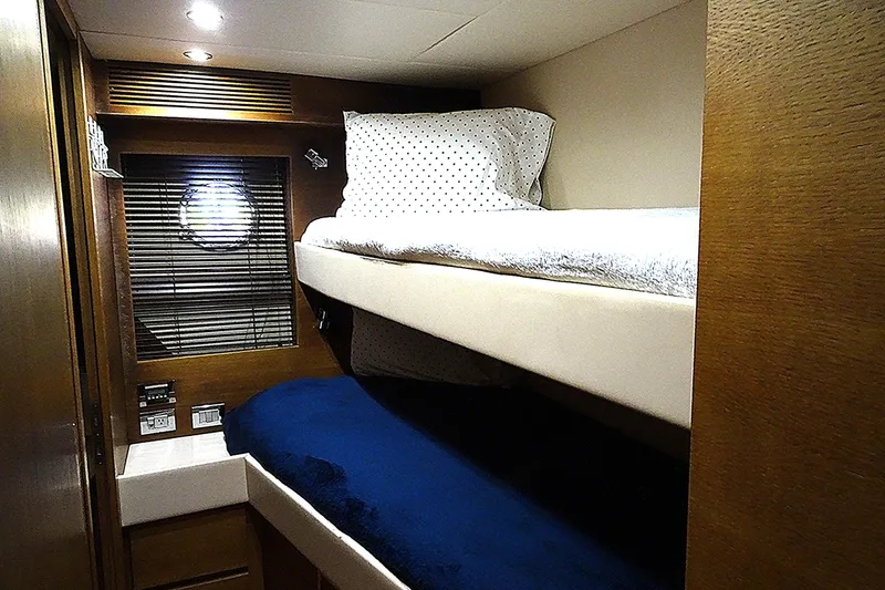 Slide: The Image of Bunk beds in 2010 Azimut 100 Leonardo yacht cabin with wooden interior. - 53