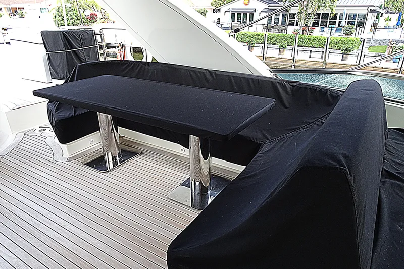 Slide: The Image of Luxury seating area on 2010 Azimut 100 Leonardo yacht with sleek black covers. - 75
