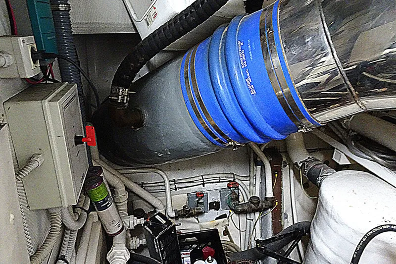Slide: The Image of Engine room of 2010 Azimut 100 Leonardo yacht with visible pipes and machinery. - 63