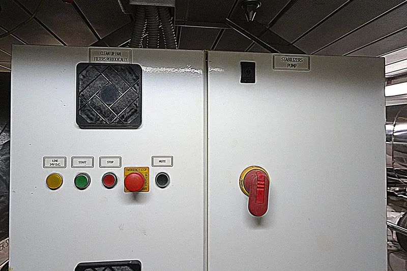Slide: The Image of Control panel on 2010 Azimut 100 Leonardo yacht, featuring emergency stop and operational buttons. - 64