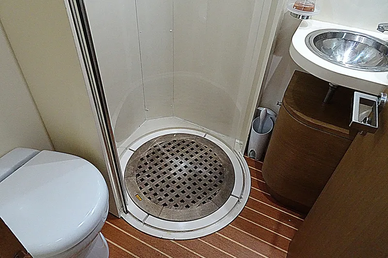 Slide: The Image of Bathroom interior of 2010 Azimut 100 Leonardo yacht with shower, toilet, and sink. - 52