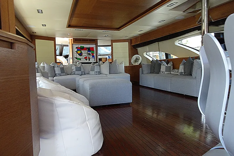 Slide: The Image of Luxurious interior of 2010 Azimut 100 Leonardo yacht with modern seating and elegant decor. - 19