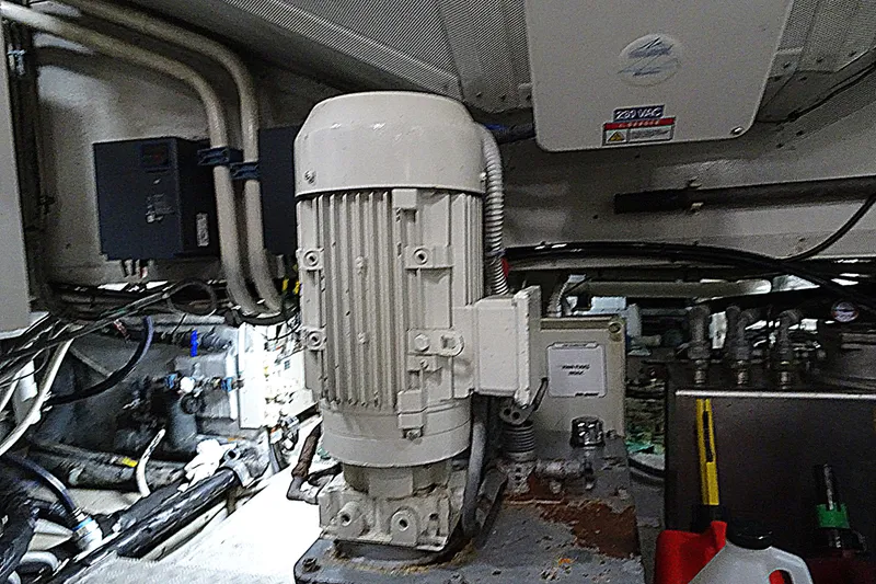 Slide: The Image of Engine room of 2010 Azimut 100 Leonardo yacht, featuring machinery and wiring. - 59