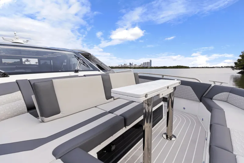 Slide: The Image of The image shows the deck of a 2027 Galeon 435 GTO with modern seating and a table. - 26