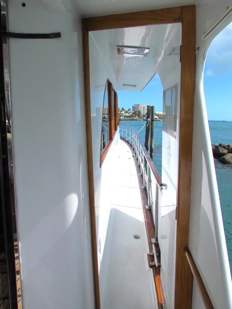 Slide: The Image of 1972 Hargrave 67 Motor Yacht side deck with ocean view. - 13