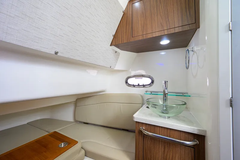Slide: The Image of Luxurious interior of 2018 Boston Whaler 380 Outrage with modern sink and seating area. - 38