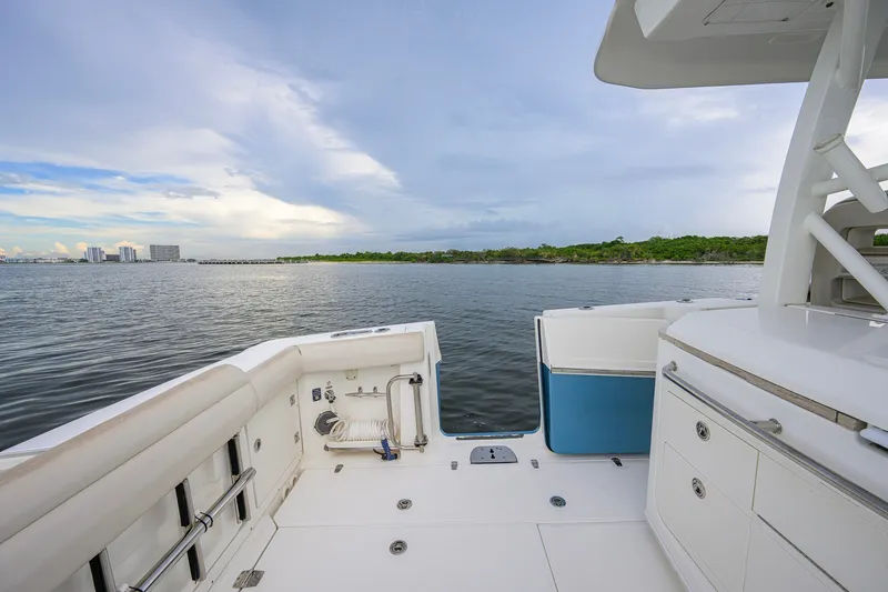 Slide: The Image of 2018 Boston Whaler 380 Outrage boat deck with ocean view and clear sky. - 60