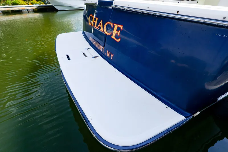Slide: The Image of 2003 Tiara Yachts 2900 Coronet, blue hull, docked in Larchmont, NY. - 6