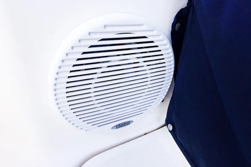 Slide: The Image of White speaker on 2003 Tiara Yachts 2900 Coronet, adjacent to navy fabric. - 31