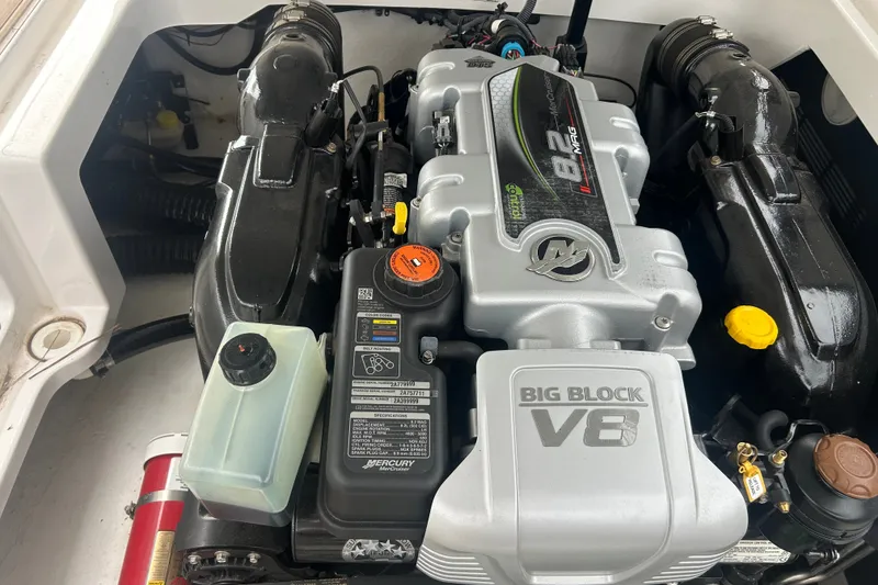 Slide: The Image of Engine compartment of a 2023 Monterey M6 boat featuring a Big Block V8 engine. - 21