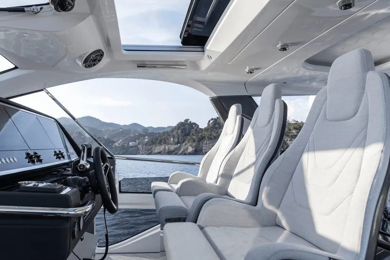 Slide: The Image of Interior of the Azimut Verve 48 with modern seating and panoramic sea view. - 26