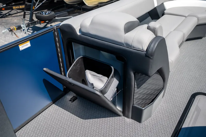Slide: The Image of Evotti 725QL 2026 boat interior with storage compartment and seating area. - 41