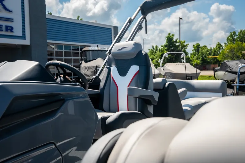 Slide: The Image of Interior of 2026 Evotti 725QL boat with modern seating and steering wheel. - 34