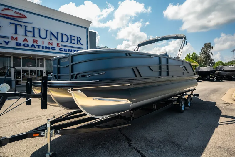 Slide: The Image of 2026 Evotti 725QL pontoon boat on trailer at Thunder Marine dealership. - 18