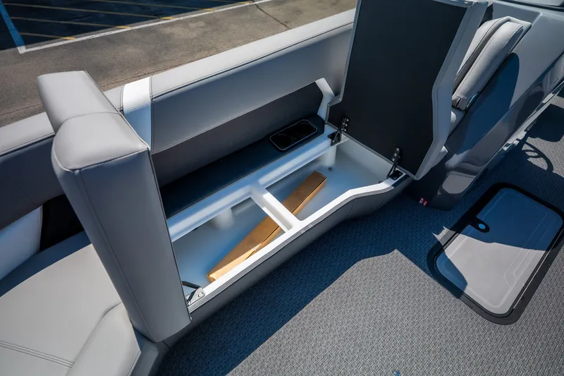 Slide: The Image of Interior view of 2026 Evotti 725QL boat with open storage compartment. - 39