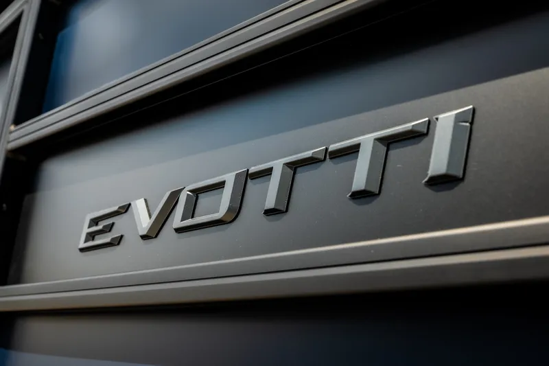 Slide: The Image of Close-up of Evotti 725QL 2026 logo on vehicle exterior. - 10