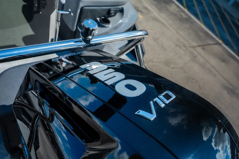 Slide: The Image of Evotti 725QL 2026 model with sleek black V10 engine, reflecting sky and clouds. - 28