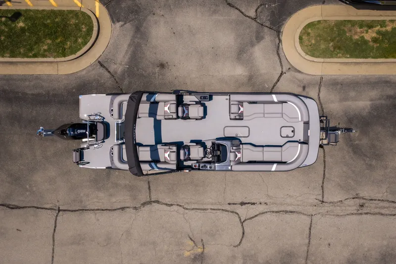 Slide: The Image of Aerial view of 2026 Evotti 725QL boat on pavement, showcasing seating and layout. - 54
