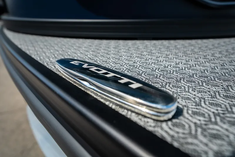 Slide: The Image of Close-up of 2026 Evotti 725QL logo on textured surface. - 7