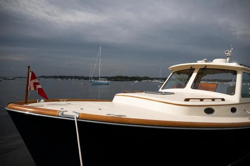 Slide: The Image of 2009 Hinckley Picnic Boat 37 MKIII docked on a calm, overcast day. - 26