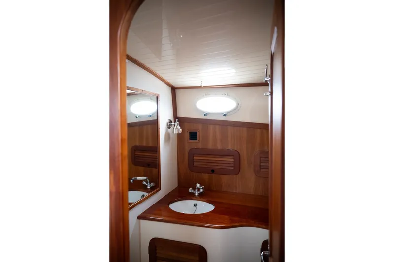 Slide: The Image of Luxurious wooden bathroom interior of 2009 Hinckley Picnic Boat 37 MKIII. - 18