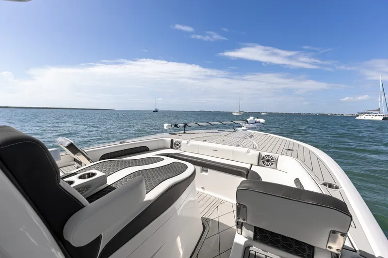 Slide: The Image of 2024 Tidewater 3100 Carolina Bay boat interior with ocean view and clear blue sky. - 43