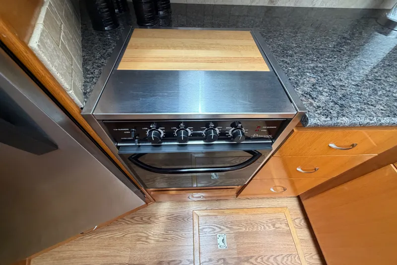 Slide: The Image of Stainless steel stove in 1989 Chris-Craft 427 Catalina yacht kitchen. - 39