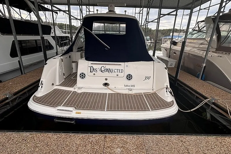 Slide: The Image of 2005 Sea Ray 390 Sundancer docked, rear view with "Disconnected" nameplate. - 4