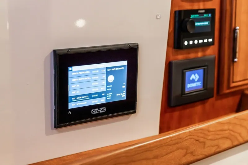 Slide: The Image of Control panel on 2026 Hinckley Picnic Boat 39, featuring CZone and Dometic systems. - 28