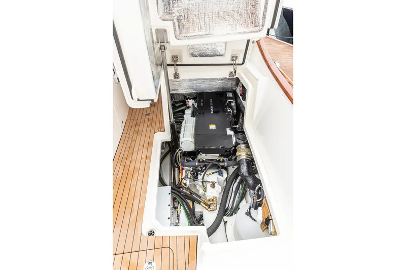 Slide: The Image of Engine compartment of 2026 Hinckley Picnic Boat 39, showcasing modern marine engineering. - 36