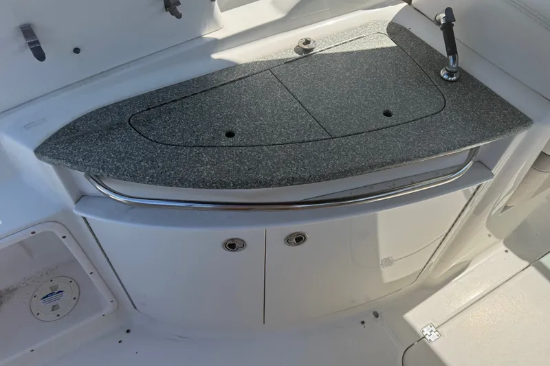 Slide: The Image of 2007 Chaparral 275 SSi boat interior with granite countertop and faucet. - 7