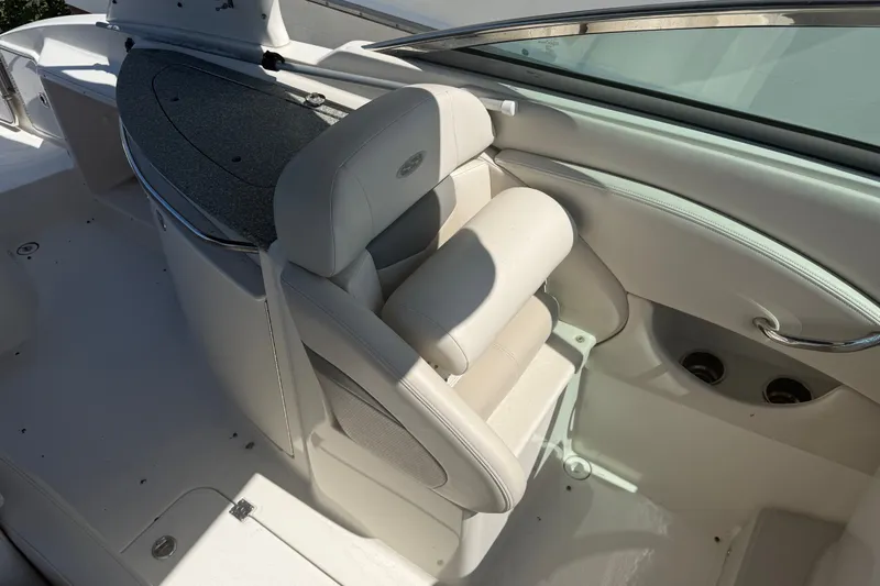 Slide: The Image of Interior of 2007 Chaparral 275 SSi boat with white seating and sleek design. - 10