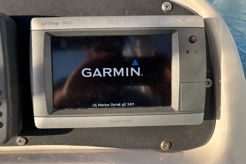 Slide: The Image of Garmin GPSmap 740s on 2004 Robalo R245 Walkaround boat dashboard. - 10