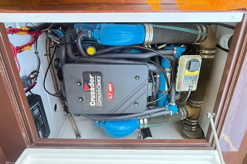 Slide: The Image of Engine compartment of a 1970 Prowler 32 Forest Johnson boat with Crusader 5.7 MPI engine. - 18